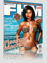 FHM Magazine Cover - Pleasure Machine w/ model in ocean wearing leopard print bikini