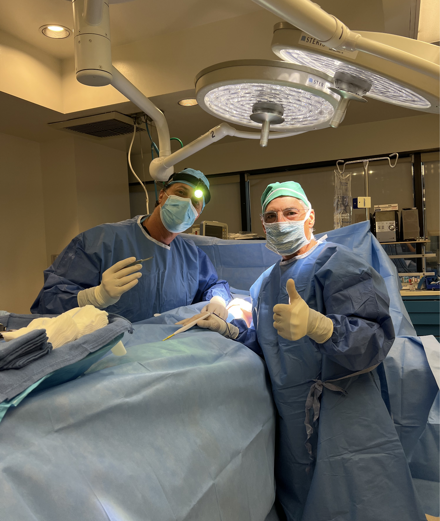 Dr. Linder and colleagues in operating room.