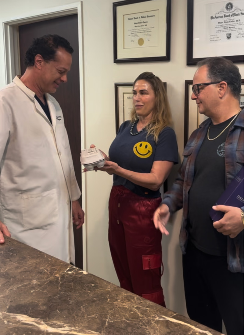 Dr. Linder discussing a procedure with patient